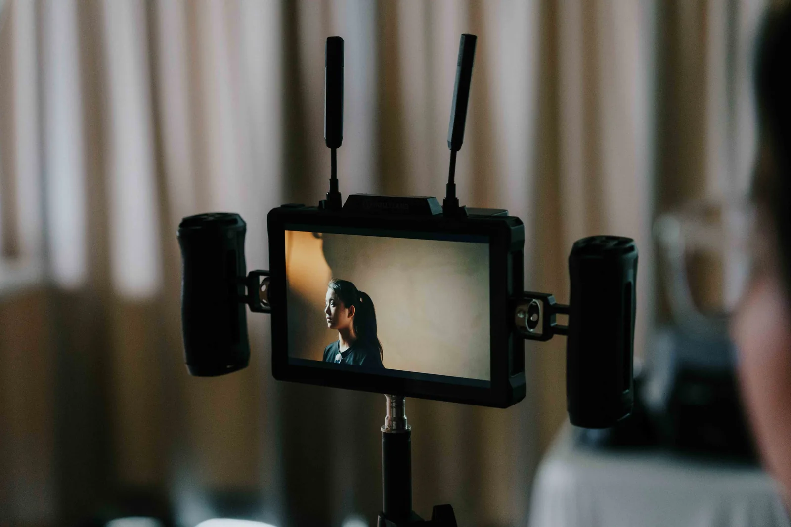 Field monitor showing a framed subject